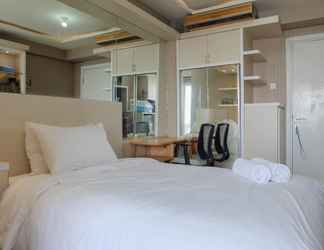 Bedroom 2 Fancy and Nice Studio at Green Pramuka City Apartment By Travelio