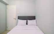 Bedroom 6 Strategic and Comfort 2BR at Bassura City Apartment By Travelio