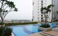 Swimming Pool 3 Strategic and Comfort 2BR at Bassura City Apartment By Travelio