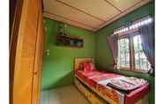 Bedroom 3 Star Homestay Kampung Warna Warni Tigarihit