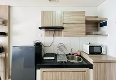 공용 공간 4 Deluxe Studio Room Apartment at Dago Suites By Travelio