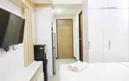 Bedroom 3 Tranquil Studio at Apartment Vida View Makassar By Travelio
