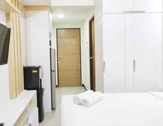 Bedroom 2 Tranquil Studio at Apartment Vida View Makassar By Travelio