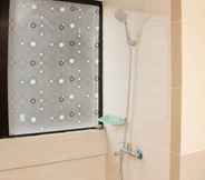 In-room Bathroom 4 Cozy and Warm Living 3BR at Meikarta Apartment By Travelio