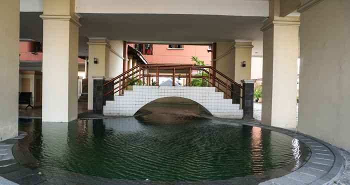 Swimming Pool Cozy and Comfort 2BR at Gajah Mada Mediterania Apartment By Travelio