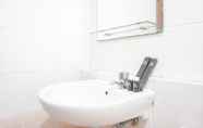 In-room Bathroom 6 Cozy and Comfort 2BR at Gajah Mada Mediterania Apartment By Travelio