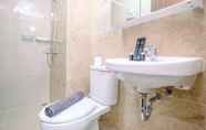 In-room Bathroom 5 Nice and Fancy 2BR at Transpark Cibubur Apartment By Travelio