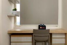 Common Space Comfort Studio Room at Apartment Margonda Residence 5 By Travelio