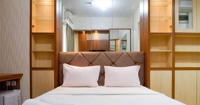 Bedroom Stylish Studio at Apartment Taman Melati Surabaya By Travelio