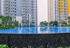 Swimming Pool 3 Well Designed 2BR at Springlake Summarecon Bekasi Apartment By Travelio