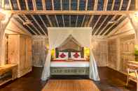 Phòng ngủ Wooden Ganeca Villas by Pramana Villas