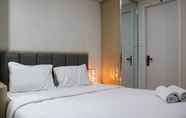 Bedroom 3 Comfy and Elegant 3BR Daan Mogot City Apartment By Travelio