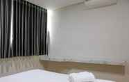 Bedroom 4 Comfy and Elegant 3BR Daan Mogot City Apartment By Travelio