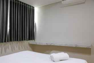 Bedroom 4 Comfy and Elegant 3BR Daan Mogot City Apartment By Travelio