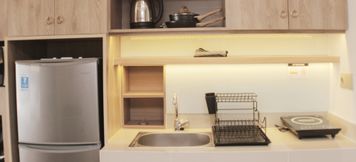 Common Space 3 Cozy and Minimalist Studio at Vasanta Innopark Apartment By Travelio