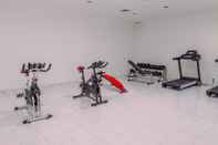 Fitness Center Warm and Tranquil 2BR Apartment at Urban Heights Residences BSD City By Travelio