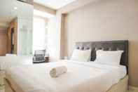 Kamar Tidur Cozy and Warm Studio at Cinere Bellevue Suites Apartment By Travelio