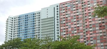 Exterior 2 THE ROOMOS Hotel Apartemen