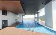 Swimming Pool 5 Cozy Living Studio Apartment at The Alton By Travelio