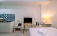 Bedroom 2 Cozy High Floor Studio Apartment at Grand Kamala Lagoon Apartment By Travelio