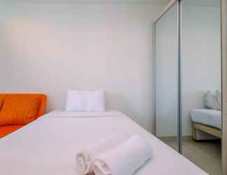 Bedroom 2 Cozy High Floor Studio Apartment at Grand Kamala Lagoon Apartment By Travelio