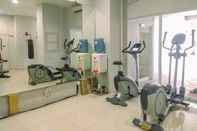 Fitness Center Cozy and Nice Studio at Tamansari Mahogany Karawang Apartment By Travelio