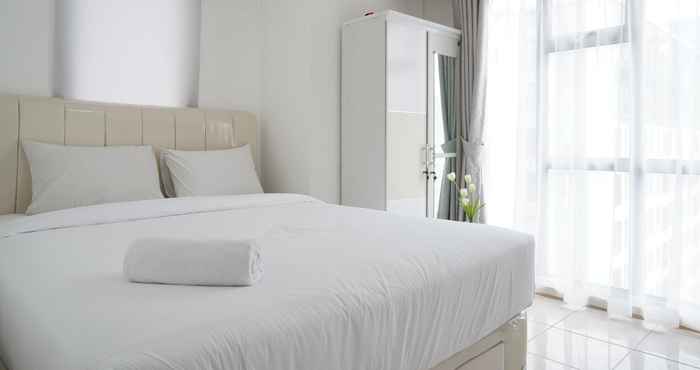 Bedroom Elegant 1BR at M-Town Residence Apartment near Summarecon Mall By Travelio