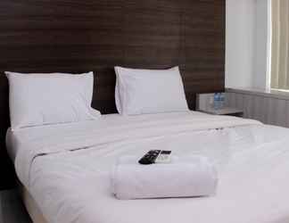 Kamar Tidur 2 Great Location Studio Room Apartment at Patraland Urbano By Travelio