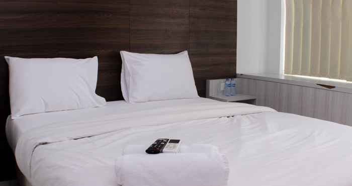 Kamar Tidur Great Location Studio Room Apartment at Patraland Urbano By Travelio