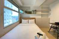 Bedroom Artsy Private Studio Room at Apartment Grand Asia Afrika Bandung By Travelio