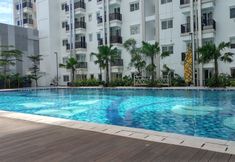 Swimming Pool 5 Comfort Living and Minimalist 2BR at Signature Park Grande Apartment By Travelio