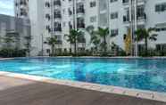 Swimming Pool 5 Comfort Living and Minimalist 2BR at Signature Park Grande Apartment By Travelio