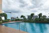 Swimming Pool Nice and Cozy Studio at Sayana Bekasi Apartment By Travelio