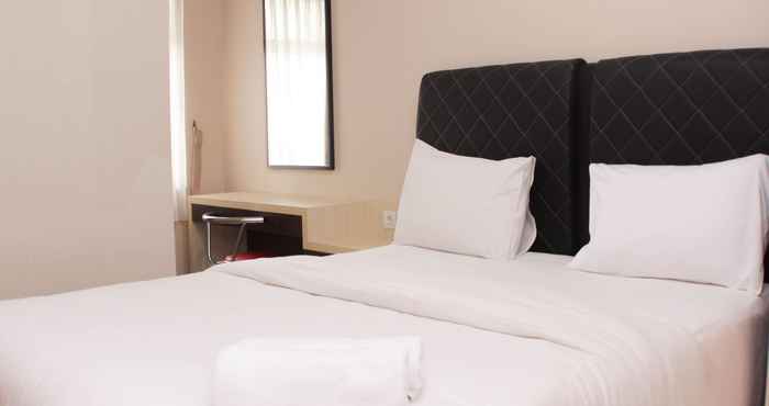 Kamar Tidur Warm and Comfy 2BR at Springlake Summarecon Bekasi Apartment By Travelio