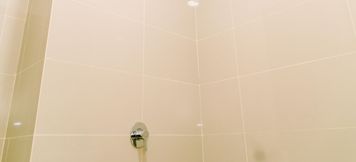 In-room Bathroom 5 Warm and Cozy Studio Room Apartment at B Residence By Travelio