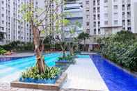 Swimming Pool Fully Furnished 2BR at Apartment Green Bay Pluit near Mall By Travelio