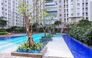 Swimming Pool 7 Fully Furnished 2BR at Apartment Green Bay Pluit near Mall By Travelio