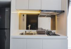 공용 공간 3 Restful and Elegant Studio at Casa De Parco Apartment By Travelio