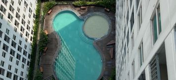 Swimming Pool 4 Cozy and Simple Living Studio at Serpong Garden Apartment By Travelio