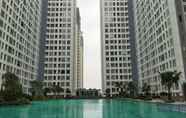 Swimming Pool 5 Best Deal 2BR at M-Town Residence Apartment near Summarecon Serpong By Travelio