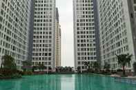 Swimming Pool Best Deal 2BR at M-Town Residence Apartment near Summarecon Serpong By Travelio