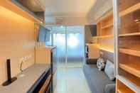 Common Space Nice and Minimalist 1BR at Gateway Pasteur Apartment By Travelio