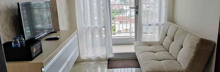 Lobi Clean and Simply 2BR Apartment at Vida View Makassar By Travelio