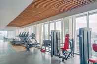 Fitness Center Nice and Elegant 1BR at The Smith Alam Sutera Apartment By Travelio