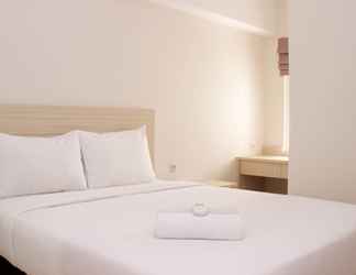 Bedroom 2 Comfy and Nice 2BR Springlake Apartment near Summarecon Bekasi By Travelio