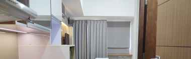 Bedroom 2 Compact Studio at Apartment Vida View Makassar By Travelio