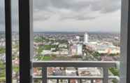 Bangunan 4 Compact Studio at Apartment Vida View Makassar By Travelio