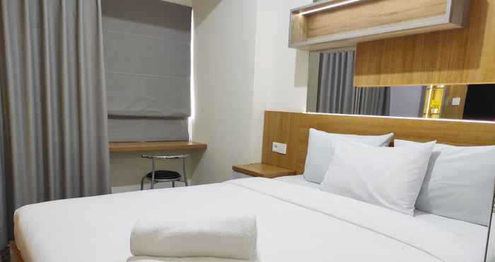 ห้องนอน Compact Studio at Apartment Vida View Makassar By Travelio