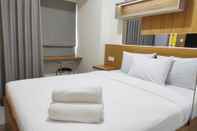 ห้องนอน Compact Studio at Apartment Vida View Makassar By Travelio