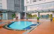 Swimming Pool 5 Comfortable and Nice 2BR Apartment at Royal Olive Residence By Travelio